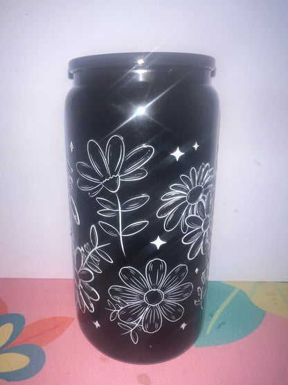 simple flowers on black glass can